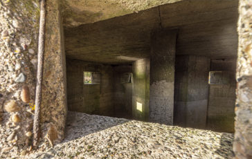 A view looking into the interior of a Type 24 Pillbox at the National Memorial Arboretumon the River Tame near Alrewas. Photo © 2022 Transforming the Trent Valley (Steven Cheshire).